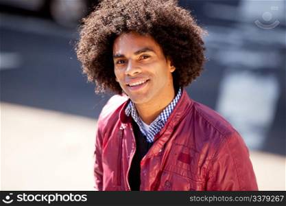 A portrait of a happy African American with an afro
