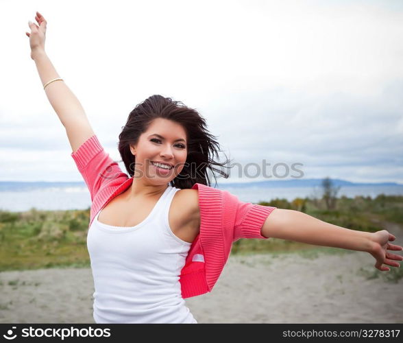 A portrait of a happy beautiful mixed race girl outdoor