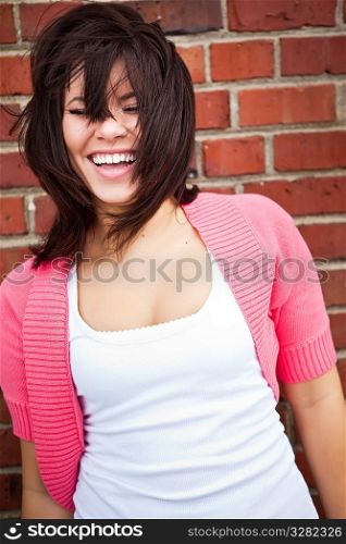A portrait of a happy beautiful mixed race girl outdoor