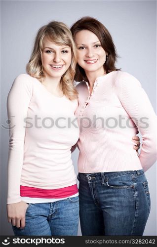 A portrait of a happy mother and daughter