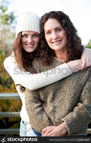 A portrait of a happy mother and daughter outdoor
