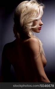 A portrait of a nude hot blonde.