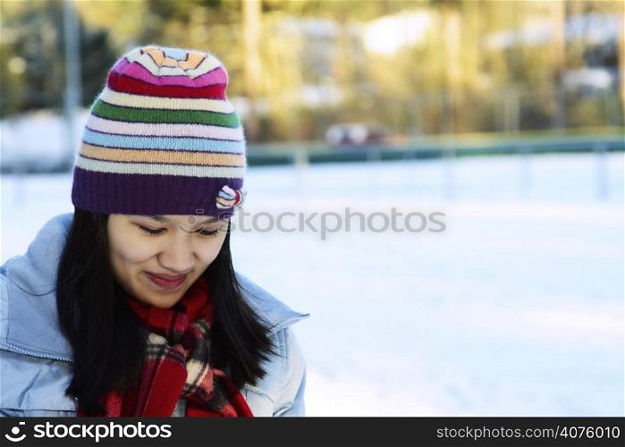 A portrait of a woman on a winter setting
