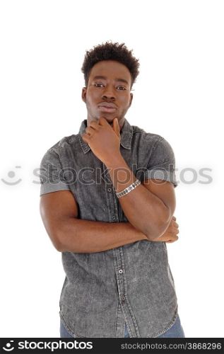 A portrait of a young African American man with one hand on his chin,standing for white background and thinking.