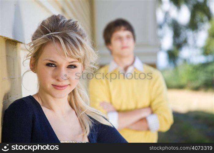 A portrait of a young caucasian couple outdoor