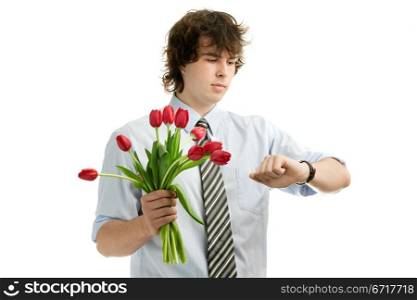 A portrait of a young man with red tulips