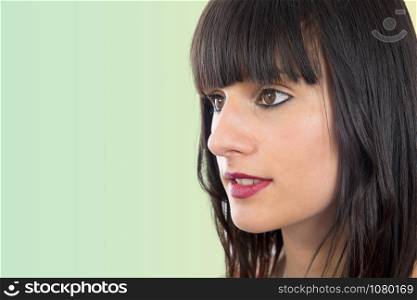 a portrait of beautiful brunette girl, side view