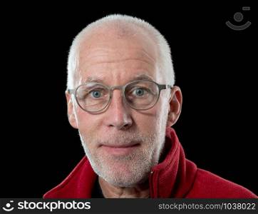 a portrait of mature man isolated on black background