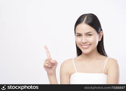 A portrait of young beautiful woman with smooth healthy skin on white background , Skincare concept . Portrait of young beautiful woman with smooth healthy skin on white background , Skincare concept