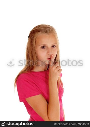 A portrait picture of a beautiful young girl holding her finger over hermouth, be quiet, isolated for white background.