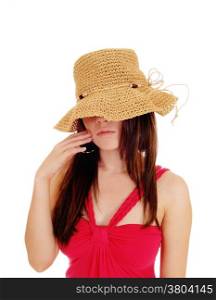 A portrait picture of a pretty young Asian woman in a red dress and straw hat standing, isolated for white background.