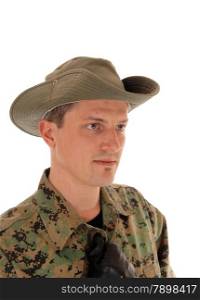 A portrait picture of a young soldier in camouflage uniform and hat,isolated for white background.