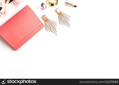 A pouch and woman accesories isolated on white background, Top view, copy space, Beauty concept