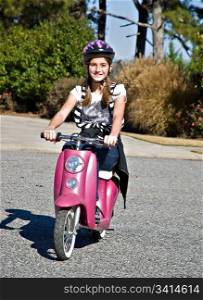 A Preteen Girl on an Electric Scooter.
