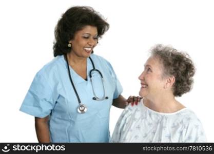 A pretty indian doctor bonding with her elderly patient. Isolated on white.