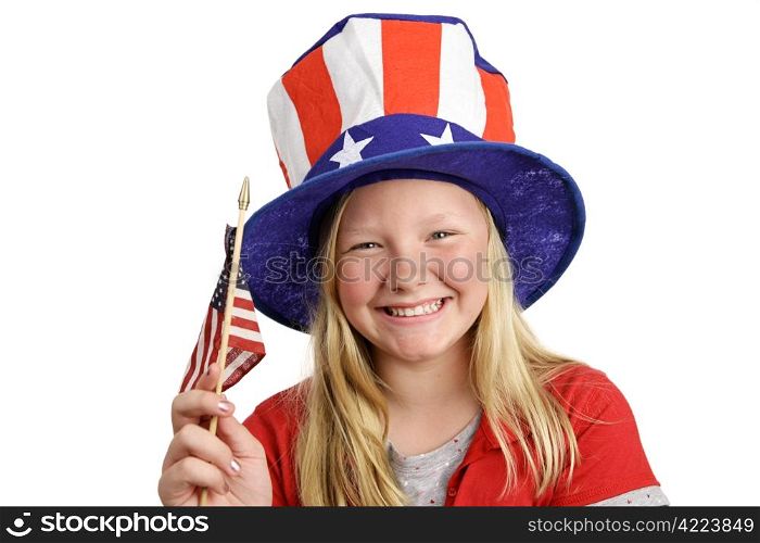 A pretty little girl in a patriotic hat waving an American flag. Isolated on white.