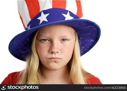 A pretty little girl in an American patriotic hat looking angry.
