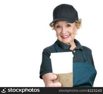 A pretty senior lady serving coffee with a smile. Isolated with room for text.