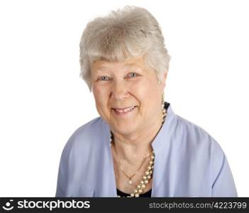 A pretty, smiling senior woman against a white background.