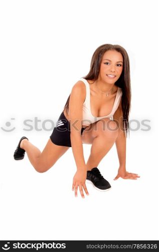 A pretty teenager girl ready for a run, isolated on white background.