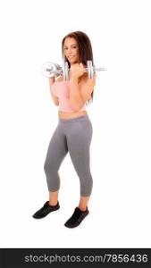 A pretty woman in grey tights and pink top standing isolated for white background, lifting dumbbell&rsquo;s.