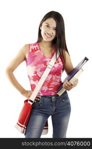 A pretty young college girl carrying books