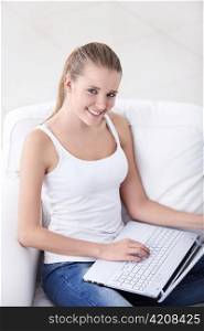 A pretty young girl with laptop
