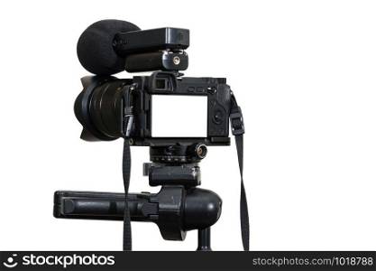 A Professional digital mirrorless camera on tripod with microphone for record on white background, Camera for photographer or Video, Live Streaming equipment concept, include clipping path