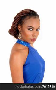 A profile portrait of a beautiful African American woman with braided hairstanding in a blue blouse isolated for white background.