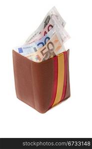 a purse with euro banknotes, in crisis, with the colors of the Spanish flag