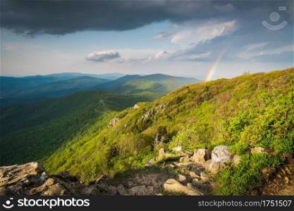 A rainbow arks towards Shenandoah National Park in Virginia after the passing of a Spring rain shower.