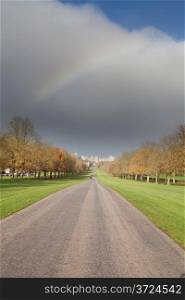 A rainbow in the distance looking down the long walk at windsor castle