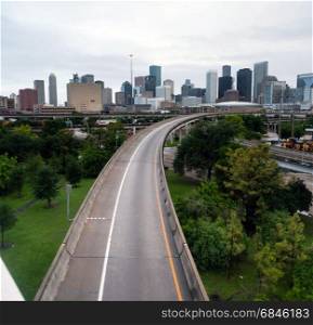 A ramp leading out of downtown Houston with no cars on it