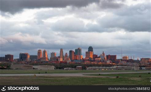 A rare view of downtown Kansas City lite up for just a moment by the setting sun
