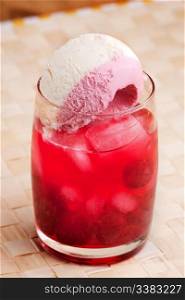 A raspberry float in an outdoor setting