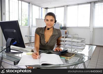 A receptionist busy at work