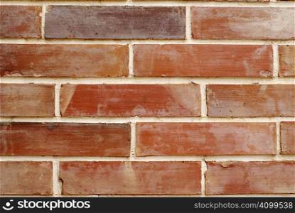 A red and orange wall was made by brick in Chinese style in Taiwan.