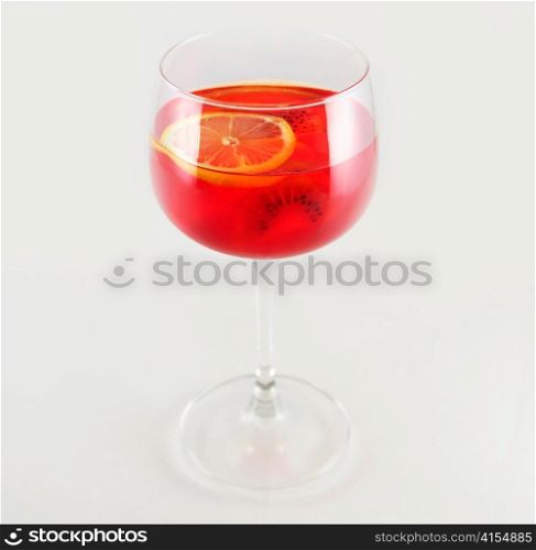 a red jello in a glass