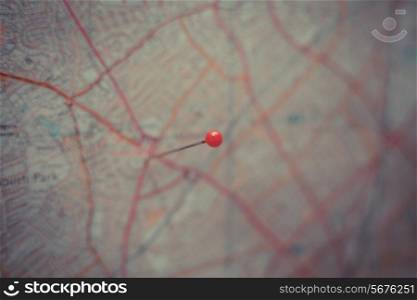 A red pin placed on a city map