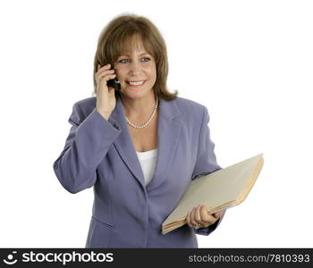 A relaxed, efficient businesswoman talking on the cellphone. Isolated.