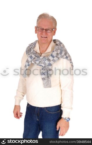 A retired senior man in a sweater and glasses standing relaxed isolatedfor white background.