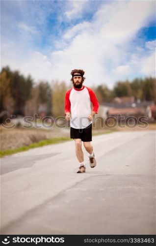 A retro style running in the country on a road