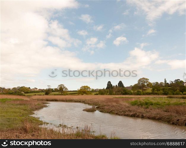 a river running through the country side serene and beautiful