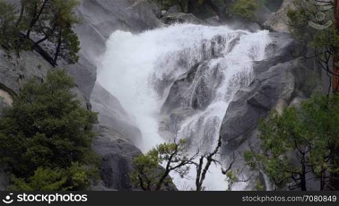 A river splashes over rocks in Yosemite