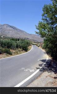 A road calms down in mountains Cretan.
