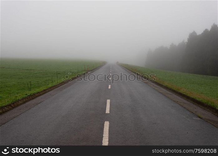 A road leading to Seven Cities (Sete Cidades) on a foggy day, Sao Miguel, Azores, Portugal