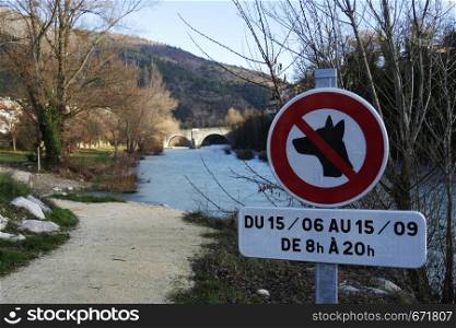 a road sign forbidden to dogs