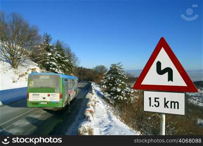 A road through the Snowy forest, Brasov, Transylvania, Romania.