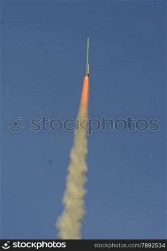 a rocket start at the traditonal rocket festival or Bun Bang Fai in Ban Si Than in the Provinz Amnat Charoen in the northwest of Ubon Ratchathani in the Region of Isan in Northeast Thailand in Thailand.&#xA;