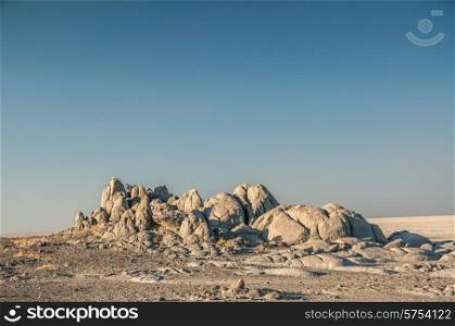 A rocky outcrop in the Makgadikgadi salt pan in Botswana near Kubu Island.